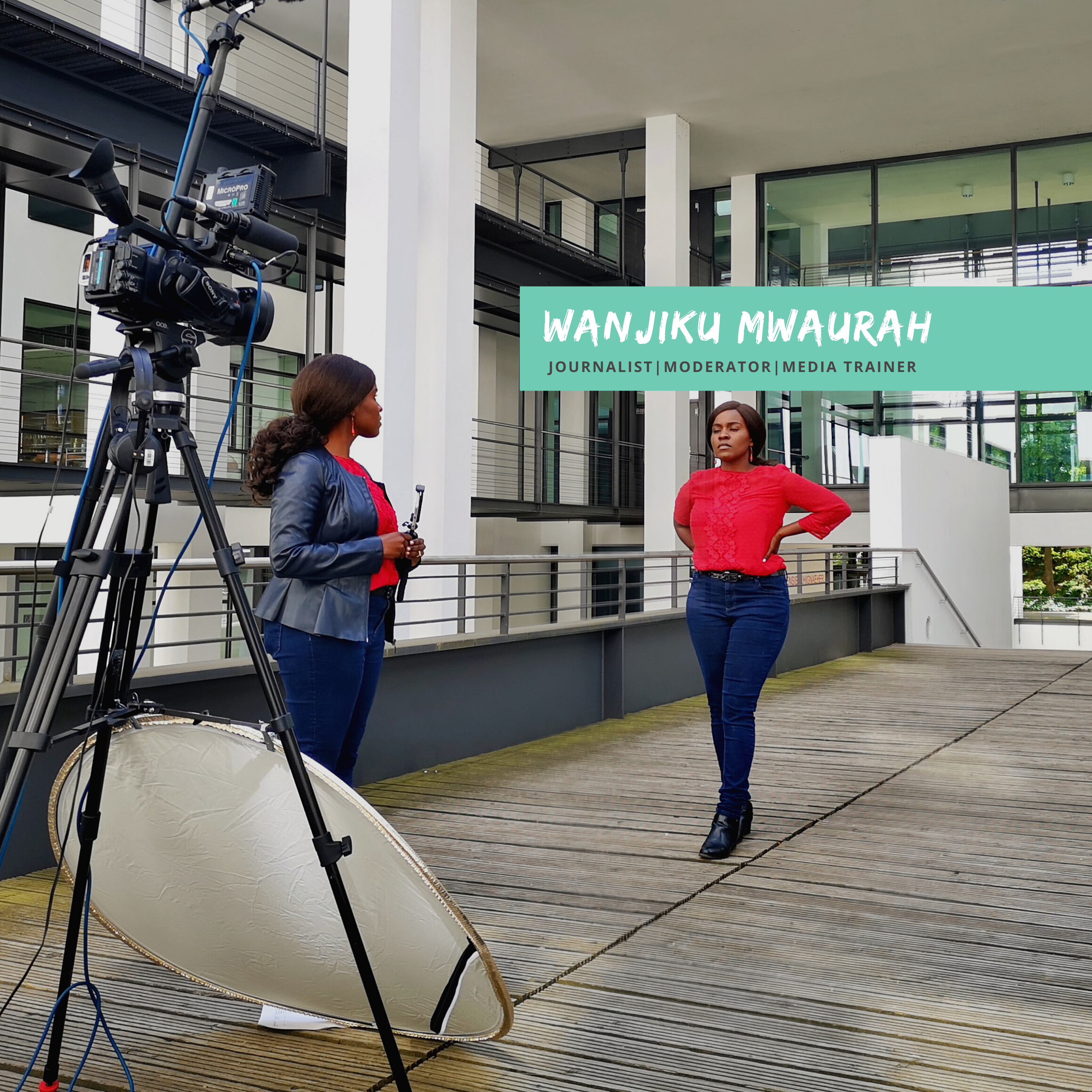 Wanjiku Mwaurah infront of a camera